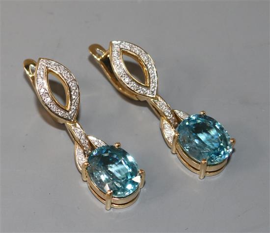 A pair of modern 18ct gold, blue zircon and diamond drop earrings, 36mm.